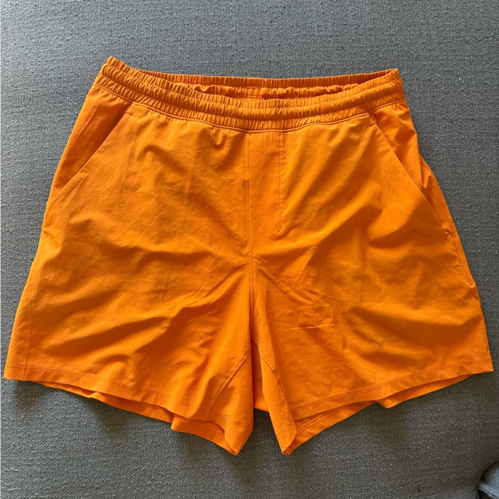 Lululemon Pace Breaker Linerless Short 5" orange
